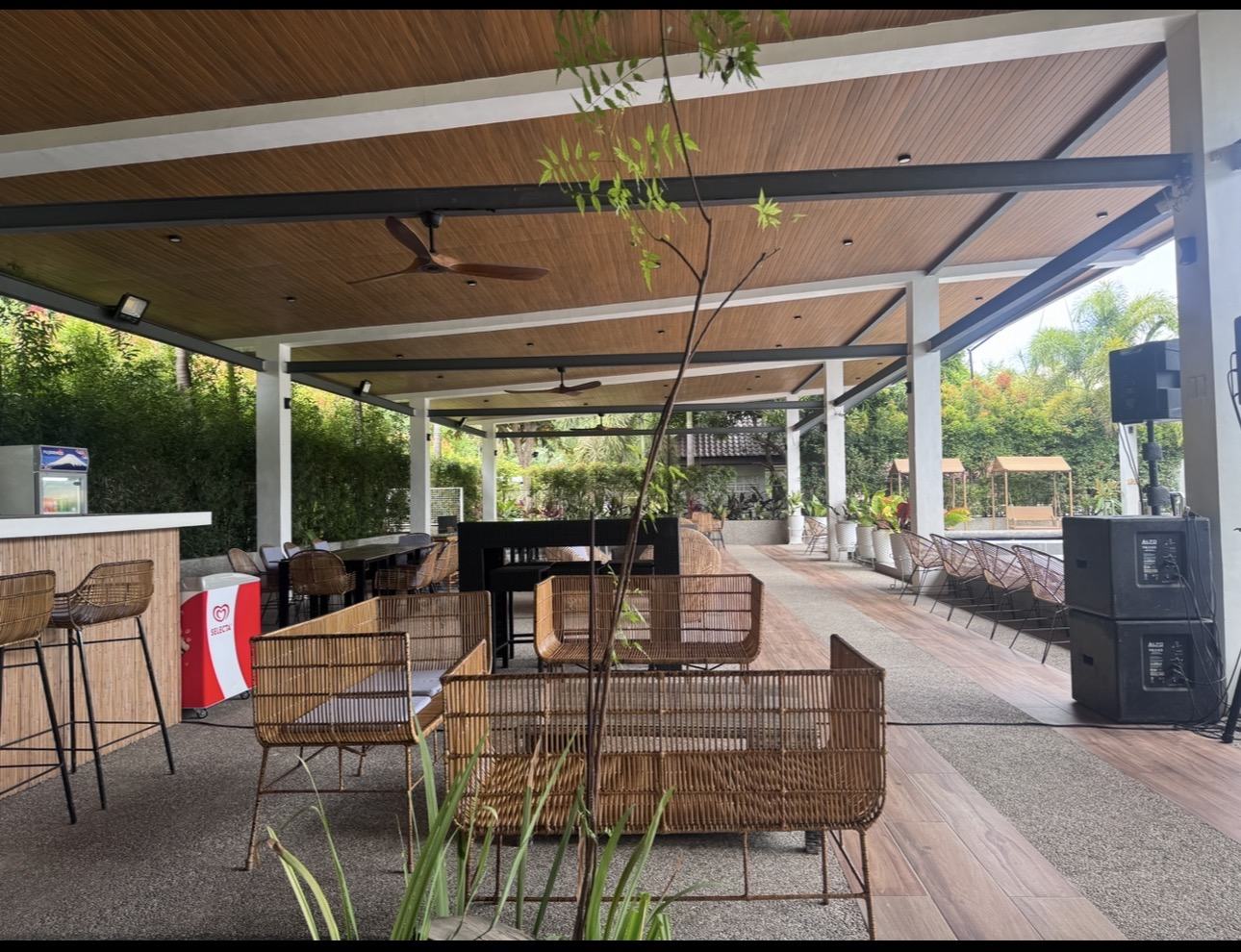 Restaurant seating area overlooking the pool at Severa